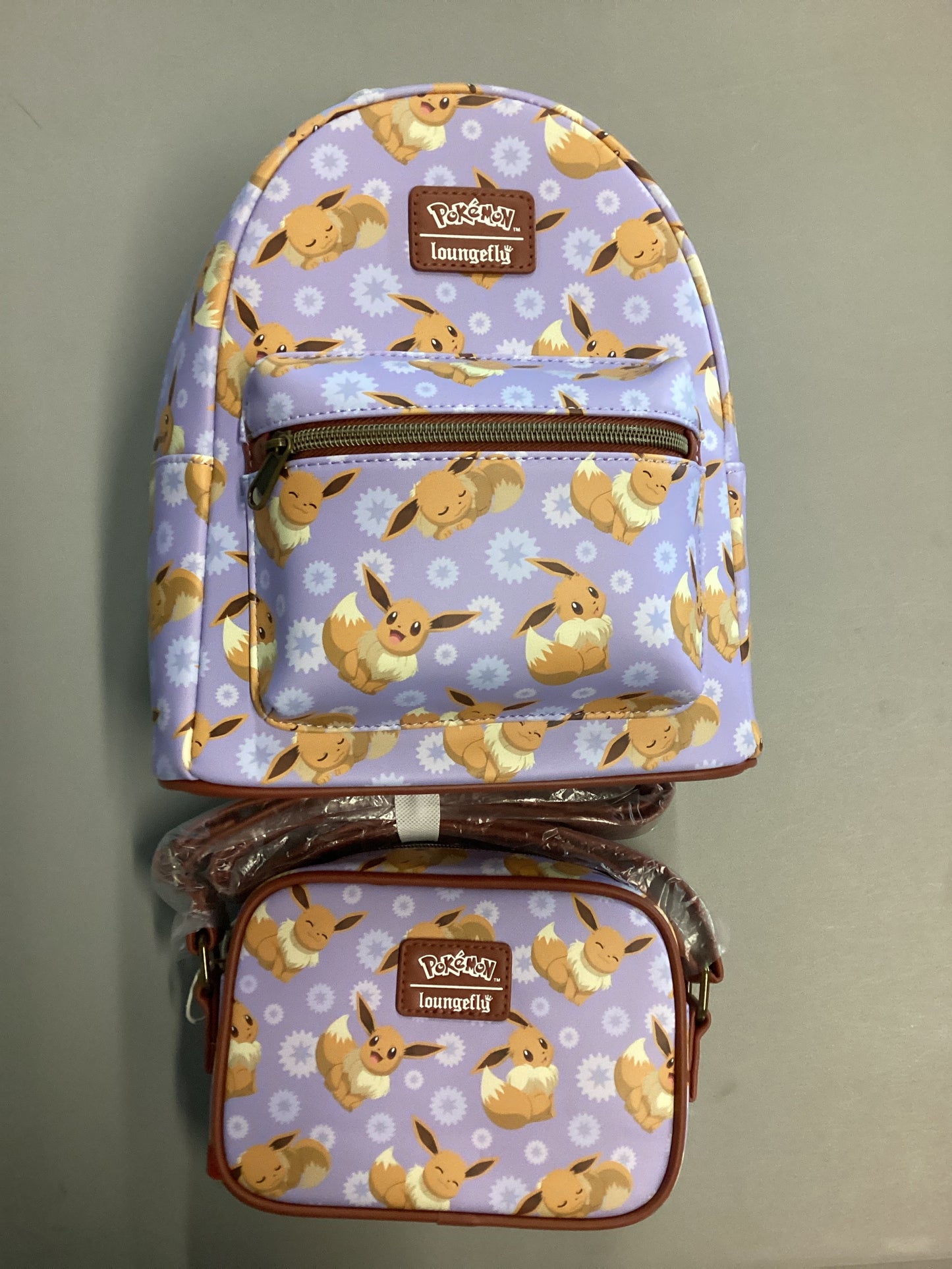 Pokemon Eevee Purple Floral Loungefly Mini Backpack And Crossbody Bag